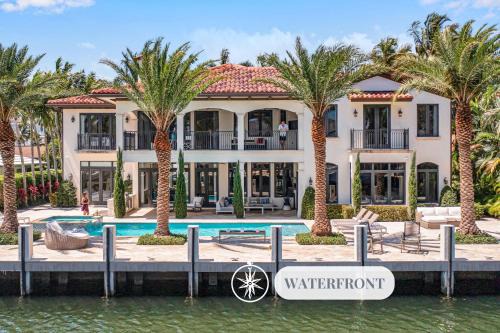 Nurmi Isles Villa | Waterfront Heated Pool Canal View Access Mimosa Key VlLLAS