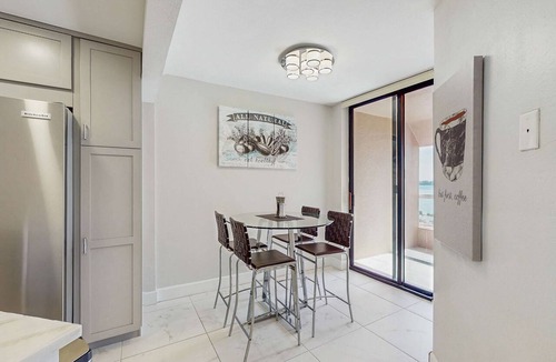 Sand Key Condo | 12th floor beachfront condo with balcony heated pool gym pool spa and tennis