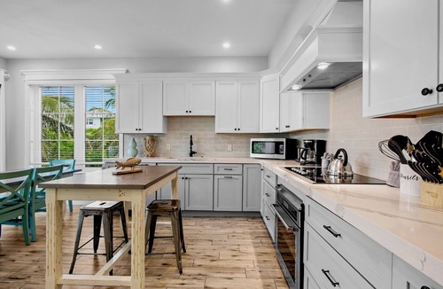 Anna Maria House | Beach Escape! Luxury Home with Pool, Spa, Rooftop Deck and Walk to Beach