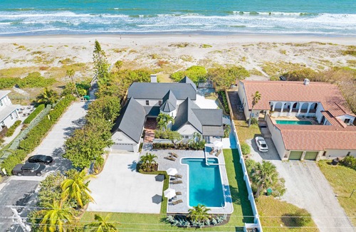 Cocoa Beach House | Beach Front Home with Gated entry Large sparkling pool and private beach access