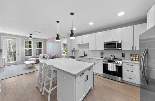 Deerwood Apartment | Beachy Oasis: Posh 2BR/2BA with Pool & Gym