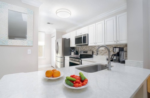 Amelia City Condo | BREATHTAKING VIEWS! 4th Floor Oceanfront Condo next to Ritz Carlton!