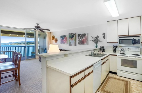 Wailua Condo | Charming Oceanfront Top Floor Condo at Wailua Bay with Stunning Views and Local Fisherman Sightings!