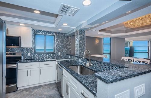 Sand Key Condo | Direct Gulf Front Southern Exposure corner unit with TWO BALCONIES! UNOBSTRUCTED Breathtaking Million Dollar Views & Magnificent Sunsets! Located in Lighthouse Towers, Clearwater Beach ~