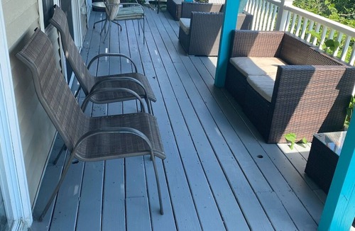 Hull Condo | Direct ocean view 2 bed 2 bath 36 ft deck walk to beach.
