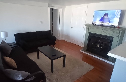 Hull Condo | Direct ocean view 2 bed 2 bath 36 ft deck walk to beach.
