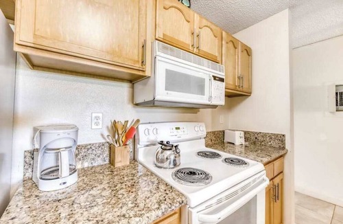 Maunaloa Apartment | Garden-View Molokai Condo with Lanai, Pool & Walk to Beach