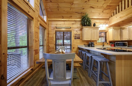 Broken Bow Cabin | Grandview ~ Riverfront with play set, hot tub, kayaks and outdoor patio
