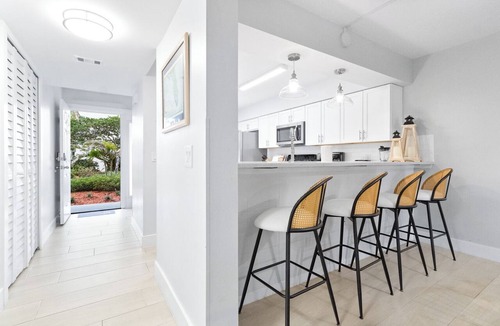 Cocoa Beach Condo | Ground Level Located Right on the Beach with Large Heated Pool and Tennis Court