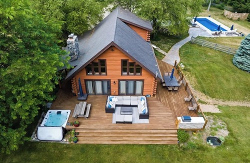 Rolling Prairie House | Juniper Presents: 15-Acre Retreat - Pool, Hot Tub, Pond, EV Charger