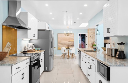 Coral Ridge Isles House | [Kids Favourite] World Cup Waterfront Hub | 6BR | Heated Pool & Arcade
