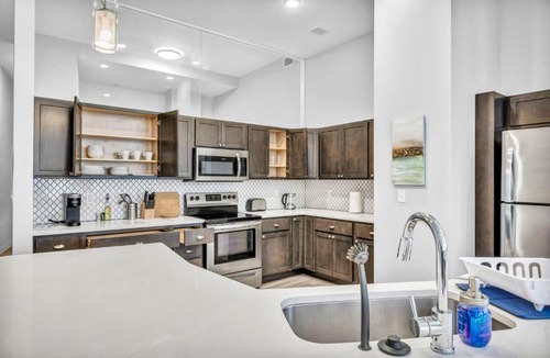 Gateway District Apartment | Luxe Flat with Heated Pool Sauna Rooftop Deck Gym