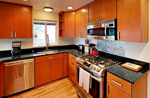 Fremont House | Mid-century modern home with canal & mountain views, & great location