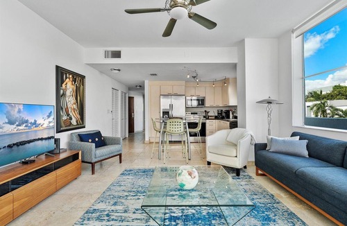 South of Fifth Condo | Modern Luxury Only Steps To The Sand! Huge Patio Deck, Modern Artwork & Extras