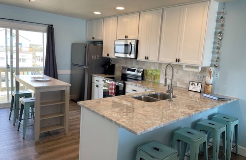 Sneads Ferry House | OCEANFRONT ! Family fun steps from the beach! Pet friendly, linens included!