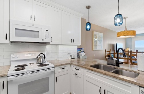 Kure Beach Condo | OD 1306 Oceanfront top floor condo. Indoor and outdoor pools
