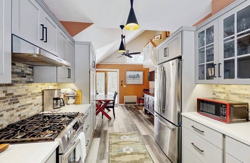Newfane House | Peaceful riverfront house, dog-friendly, woodstove, decks, bbq, firepit, dock