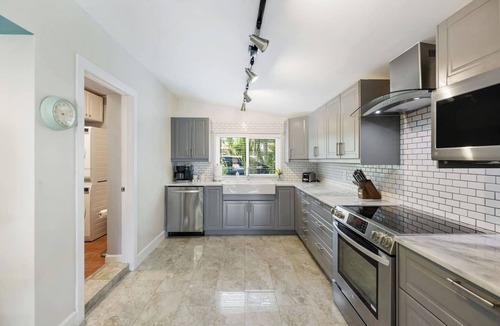 Poinsettia Heights Villa | Poinsettia Palms! Giant Heated Pool! Hot Tub, Fire Pit, PuttngGreen, N64, IceBath, Gym!