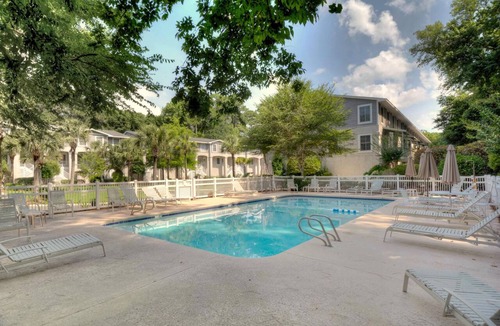Demere Park Condo | Private Elevator 5 Balconies Pool St. Simons Rental
