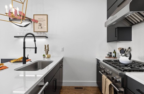 Katie Hill Neighborhood House | Rooftop Hot Tub + Games + Views Near Broadway | Dixieland Delight by AvantStay