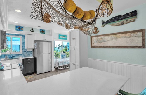 Holmes Beach Condo | Sandy Cheeks & Barefeet, Gorgeous interior Gulf beach Place, pool, on beach side