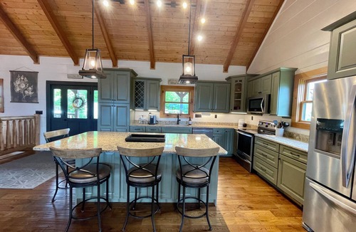 Chalet Village North Cabin | STUNNING MOUNTAIN VIEWS! Multiple HUGE Decks, Game Room, Fire Table, Hot Tub!