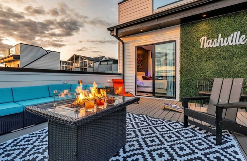 Katie Hill Neighborhood House | Summer rooftop decks, hot tub, speakeasy lounge near Nissan Stadium