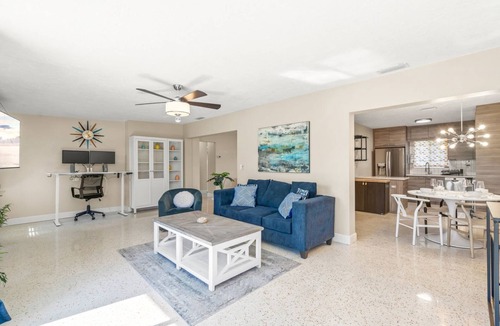 Ridge Wood Heights House | The Sarasota Starburst: Mid-Century Modern Home with Heated Pool, Dog Friendly, & Ideal Work Setup