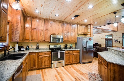Broken Bow Cabin | Treasured Times-Spacious living area; Hot tub; Playset; Large yard!