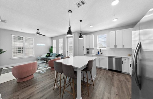 Deerwood Apartment | Tropical Retreat: Luxe 2BR/2BA with Pool & Gym