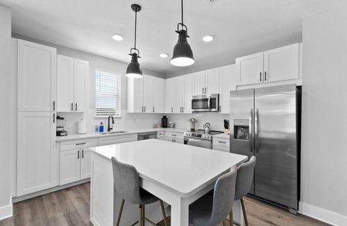 Deerwood Apartment | Tropical Retreat: Luxe 2BR/2BA with Pool & Gym