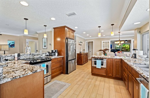 Venetian Way House | Waterfront Heated Pool w/Boat Dock & Cosmic Mini Gof - 4bd 2ba Paradise Found
