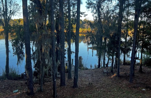 Fairfield Harbour House | Waterfront home with dock and community boat ramp and HUGE screened in porch.