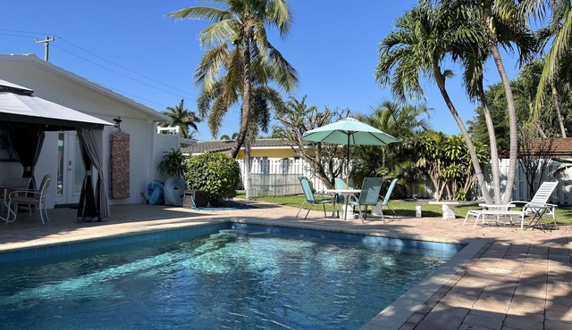 1 Bedroom Suite in a duplex house- private heated pool for you- walk to beach
