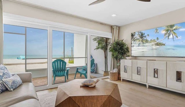 Beachfront Paradise! Ground level with Heated pool