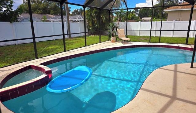 Beautiful heated pool & spa home, walk to Shamrock Park and close to beaches.