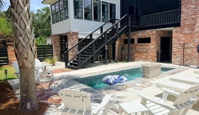 Coastal Luxury with Heated Pool, Putting Green & Game Room