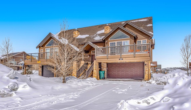 Delightful mountain-view duplex with fireplace, deck, grill, & wonderful views