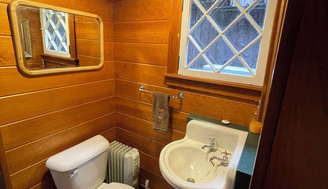 Historic 1908 “Great Camp” with private sandy beach, dock and WI-FI on Long Lake