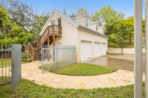 Inviting Waterfront Home with Pool, Patio, Fireplace, W/D, & Dog-Friendly