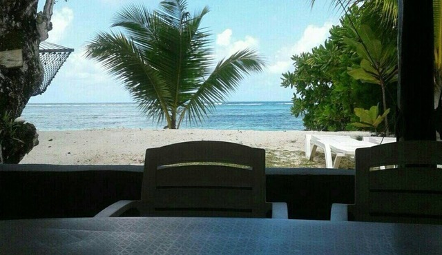 "L'Escapade Beach Villa", nestled on white sand beach, palms & ocean, 3 bedrooms
