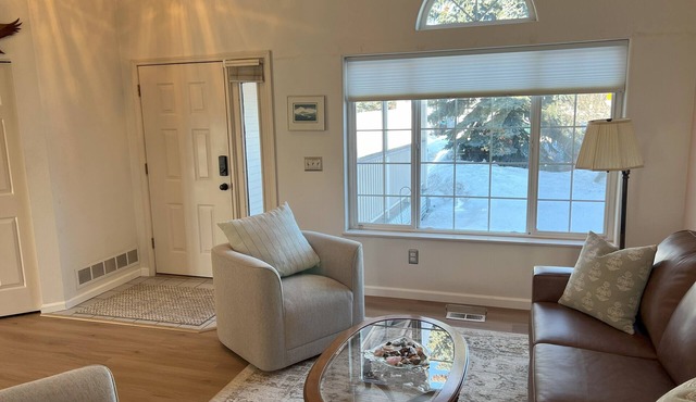 Large home with view of float plane lake