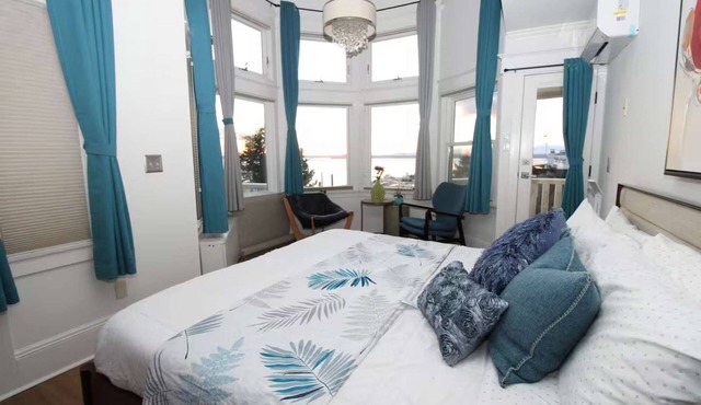 Luxurious Multi-Level Home with Breathtaking Mountain & Water Views - Prime Seattle Location!
