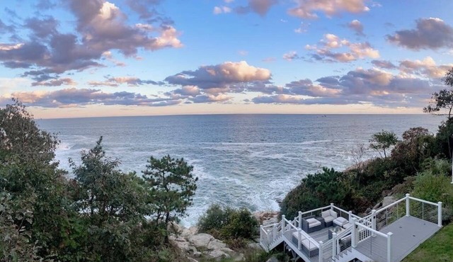 Modern oceanfront home with scenic deck, grill, games, chef's kitchen, & W/D