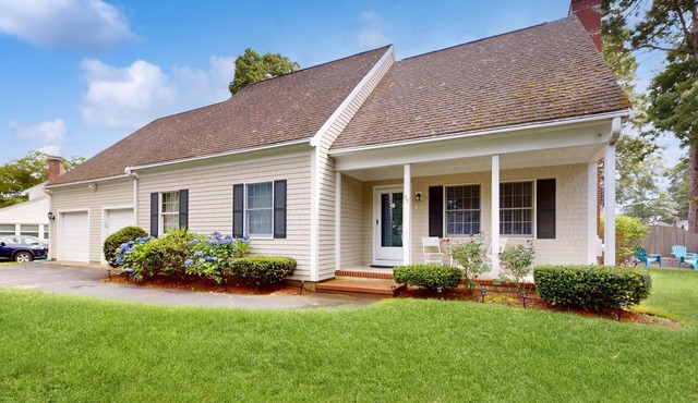 Serene home near the beach with open floor plan, yard, grill, & central AC