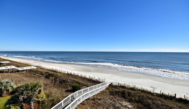 Spacious 7 BR, 7.5 BA oceanfront house with screened porch and hammock = RELAX