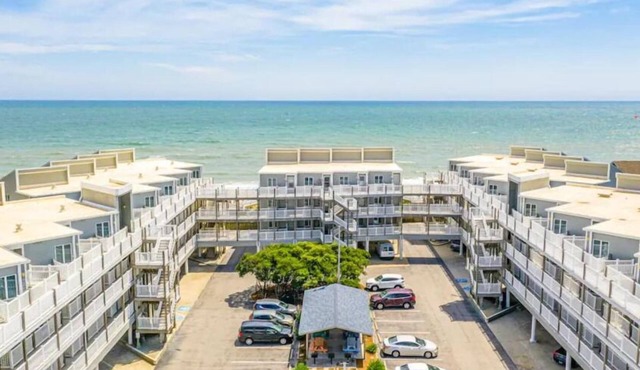 Spectacular partial ocean view 2BR 2BA large top floor condo-beachfront complex!