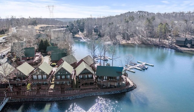 THREE-LEVEL LAKEFRONT DESIGNER CHALET: ONLY 9 MILES FROM CLEMSON!