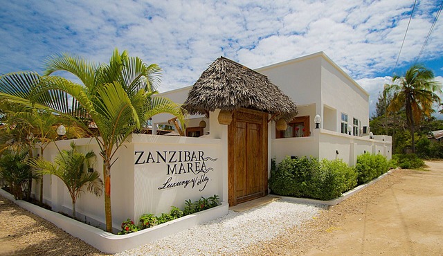 Villa with two double master suites, a private pool, and an exclusive beach area
